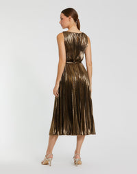 Woman wearing a gold metallic dress on a white background
