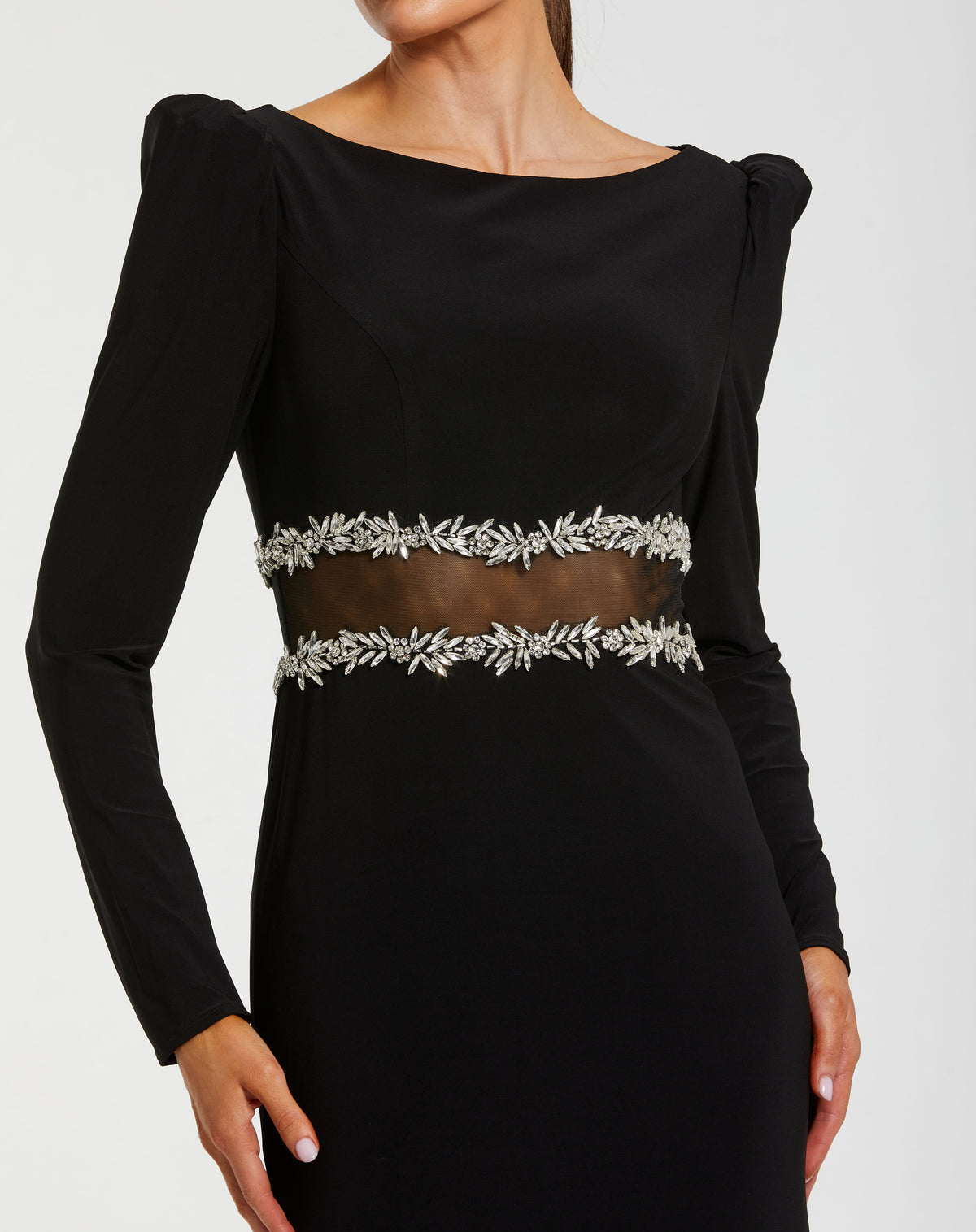 Black dress with silver embellishments on a white background