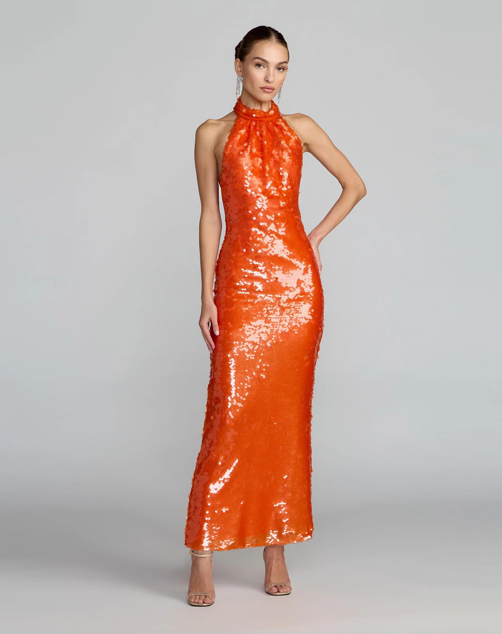 Orange sequin halter open back midi dress