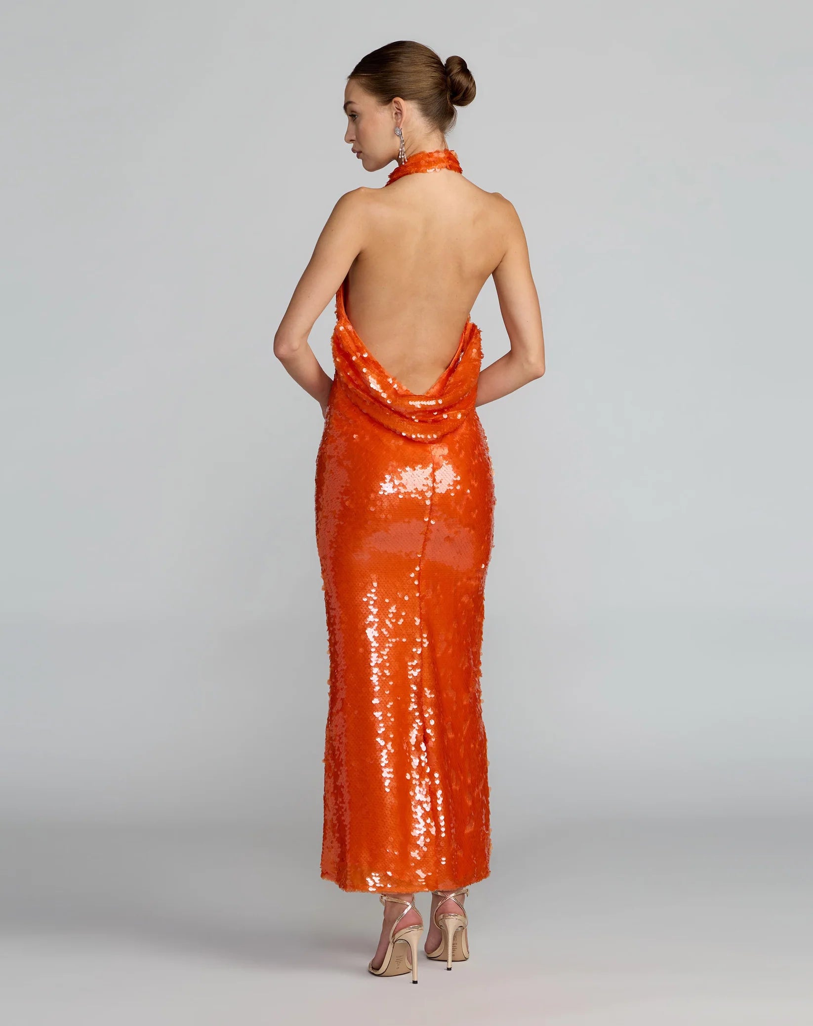Orange sequin halter open back midi dress