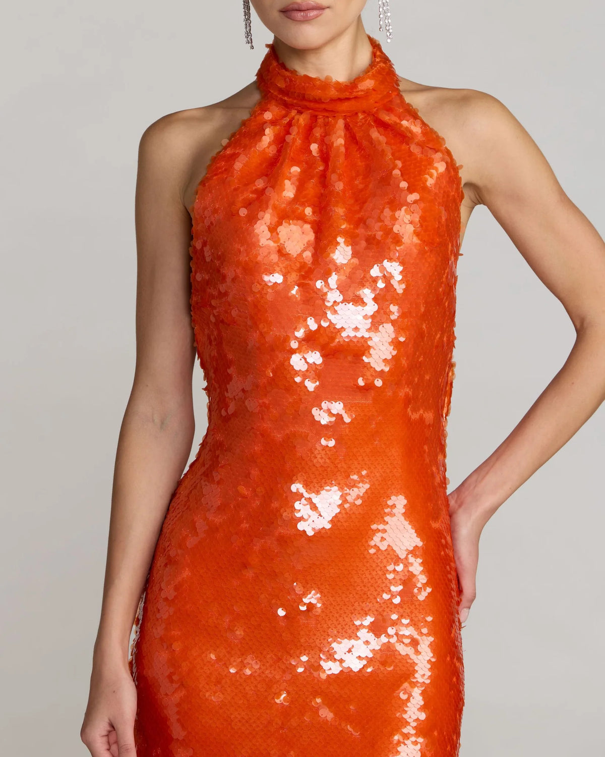 Orange sequin halter open back midi dress