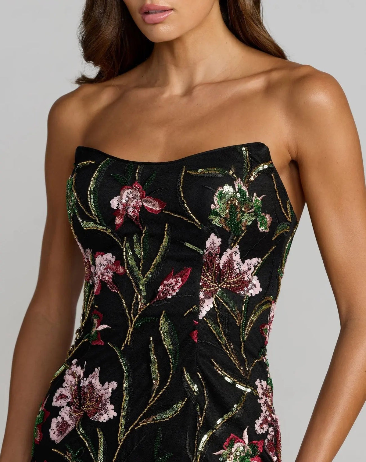 Close-up-of-sequin-and-beaded-botanical-embroidery-on-black-mesh