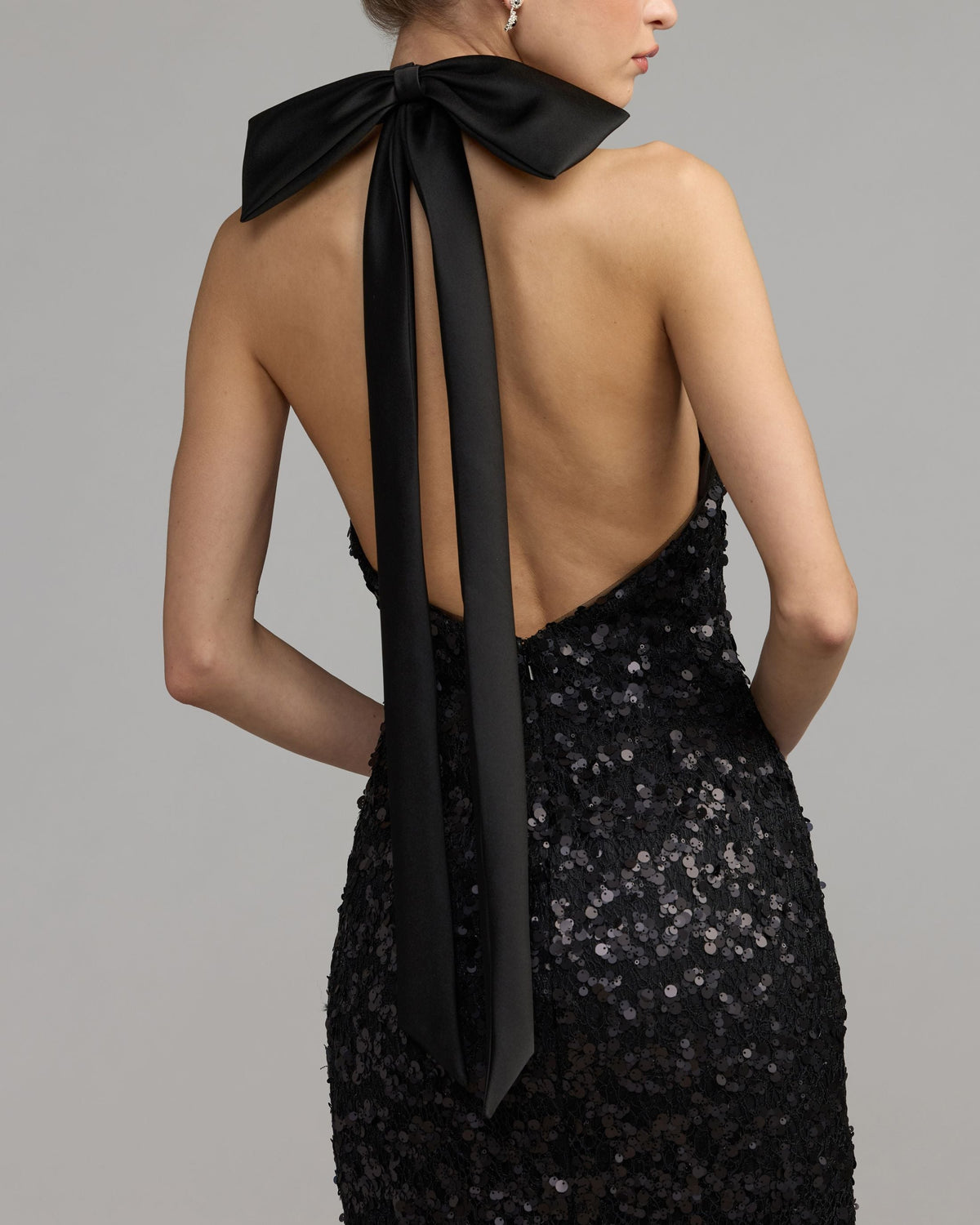 Mac Duggal #27893 black sequin halter bow midi dress close-up