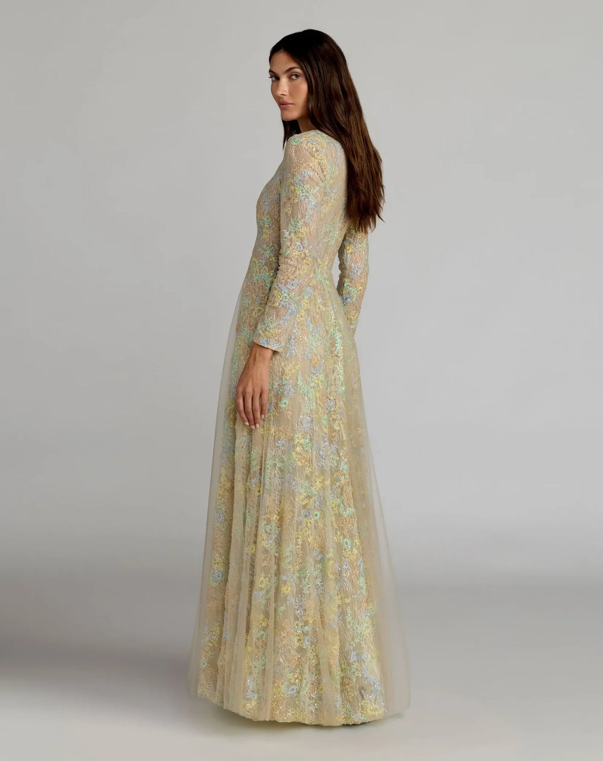 Side view of model in Mac Duggal Style 37016 | Nude Multi Long Sleeve Embellished Lace A-Line Gown
