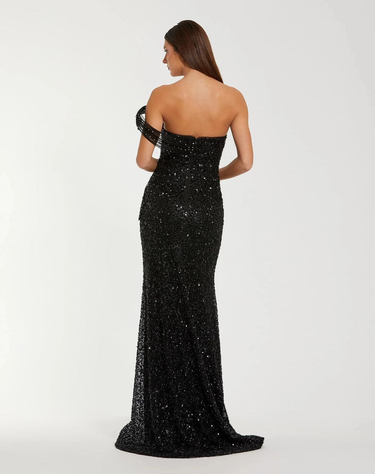 37085-Black-BK.jpg: Back view of the Black formal dress highlighting the uniform sequin pattern and the elegant small sweeping train.