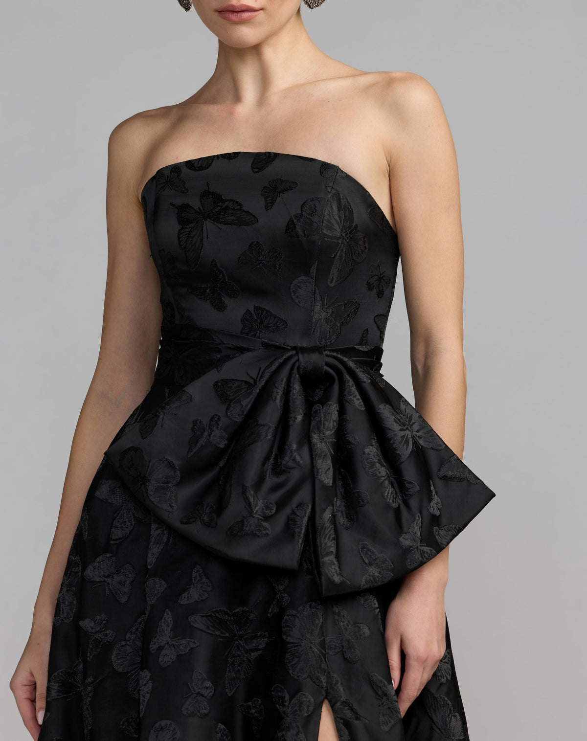 Mac Duggal #37097 black strapless brocade a-line gown with bow close-up