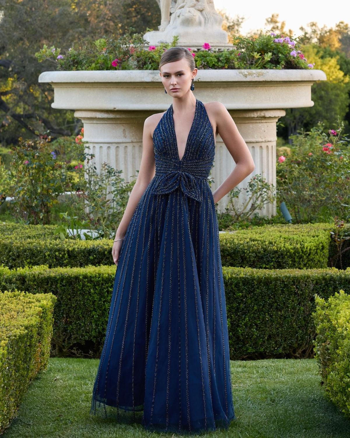 Studio shot of model wearing Mac Duggal 37120 midnight A-line gown