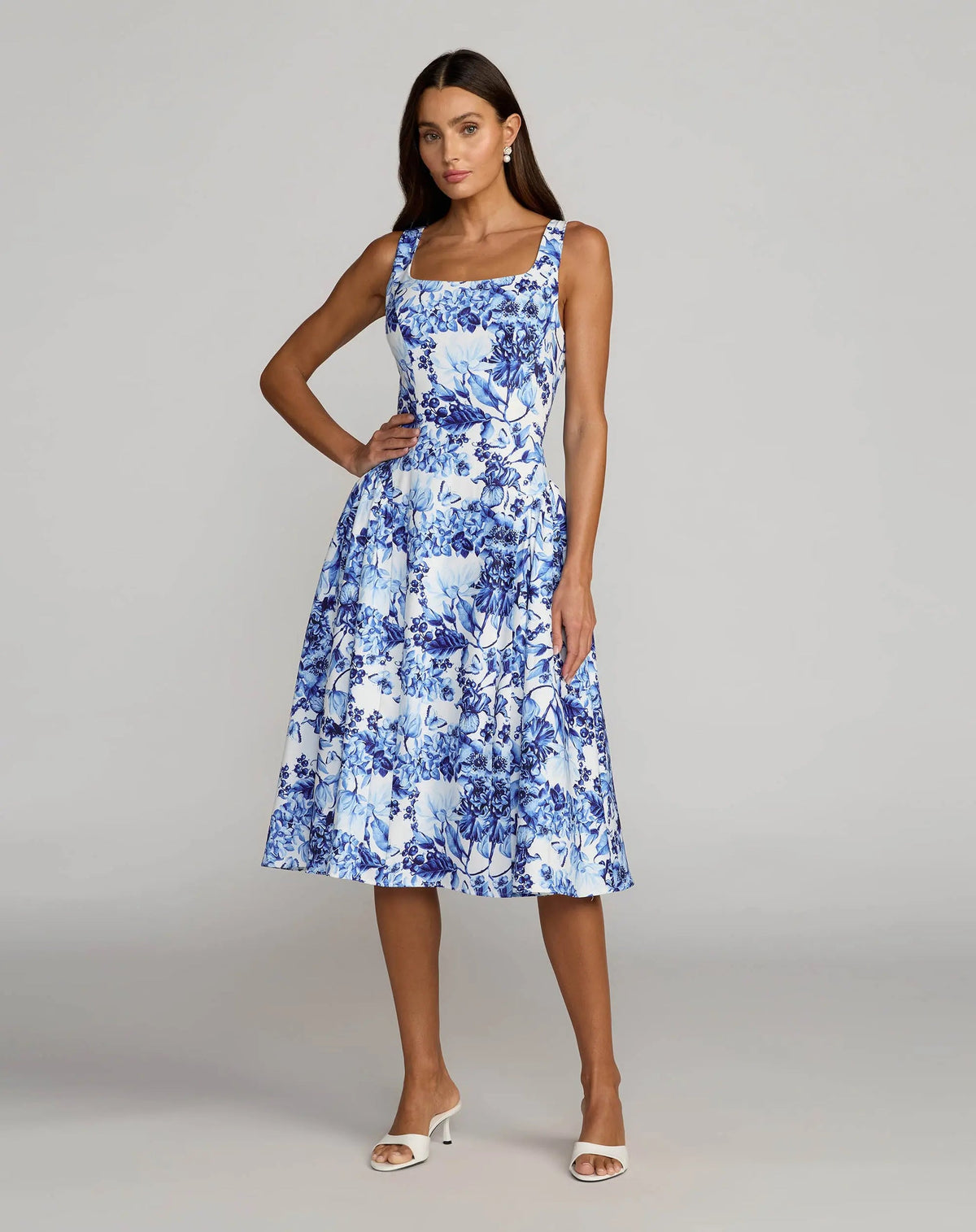 Full-length front view of the square-neck crepe cocktail dress displayed in an alternate Blue Multi floral pattern.