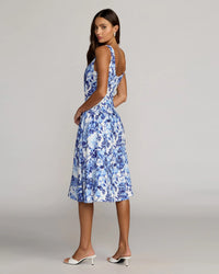 Back view of the Blue Multi variation highlighting the scoop back and fluid midi-length skirt.
