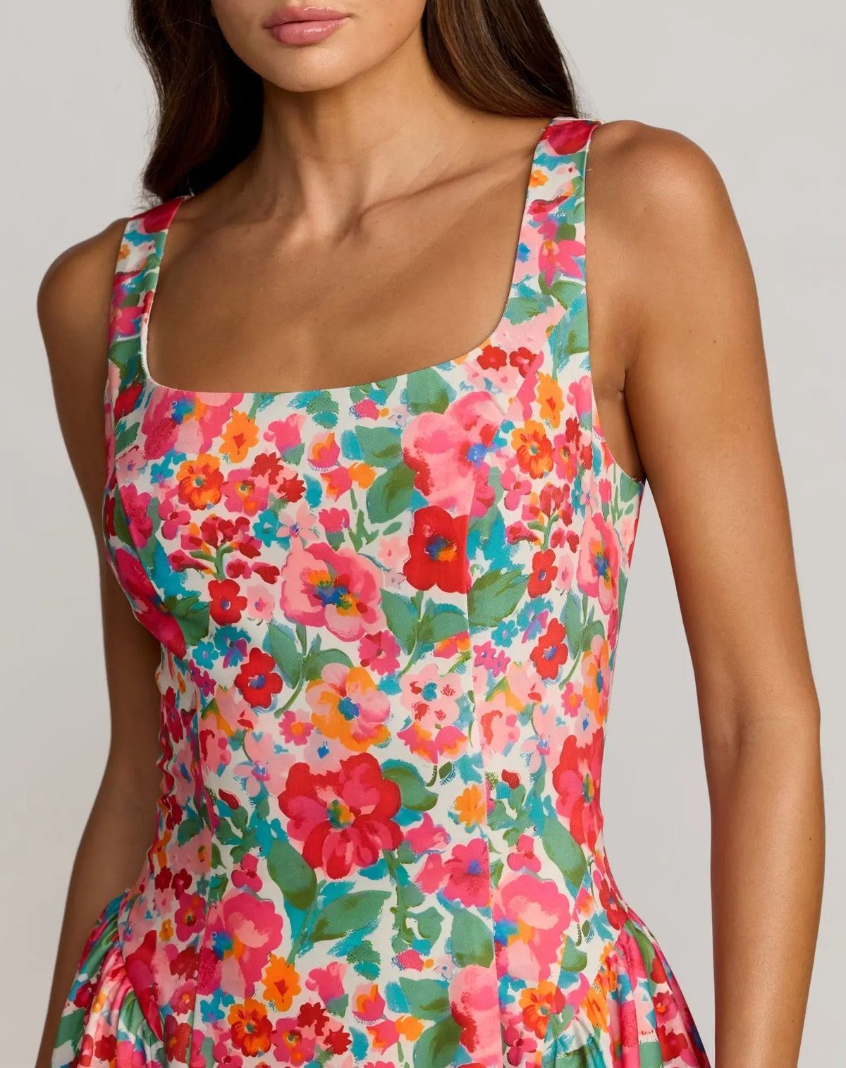 Close-up studio view focusing on the clean lines of the square neckline and wide shoulder straps on the Pink Multi colorway.