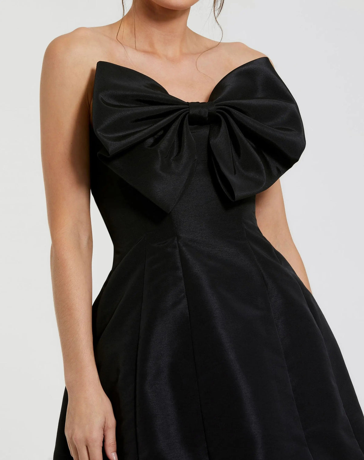 Mac Duggal #49210 black oversized bow detail close-up