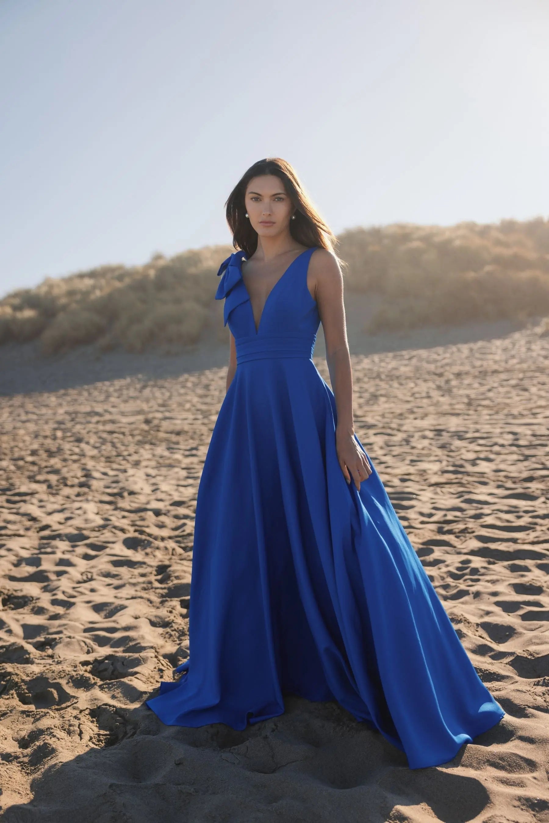 Mac Duggal #49972 cobalt sleeveless plunge neck ball gown with bow detail