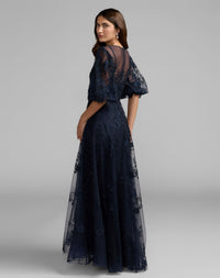 Mac Duggal 50671 Midnight embroidered illusion neck puff sleeve A-line gown - Back view
