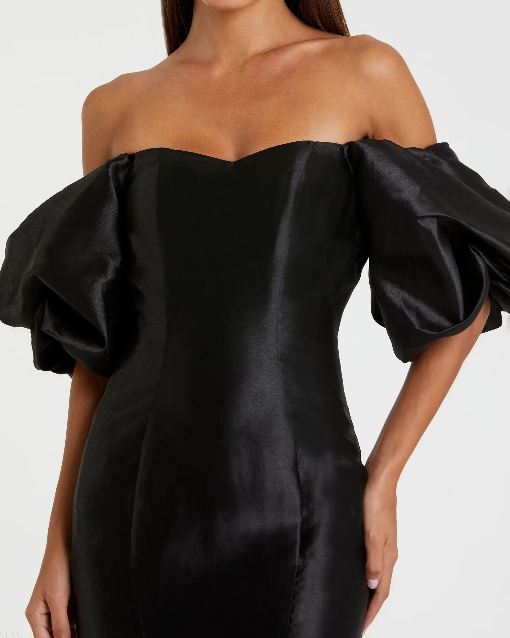 Black off-shoulder dress with ruffled sleeves on a white background