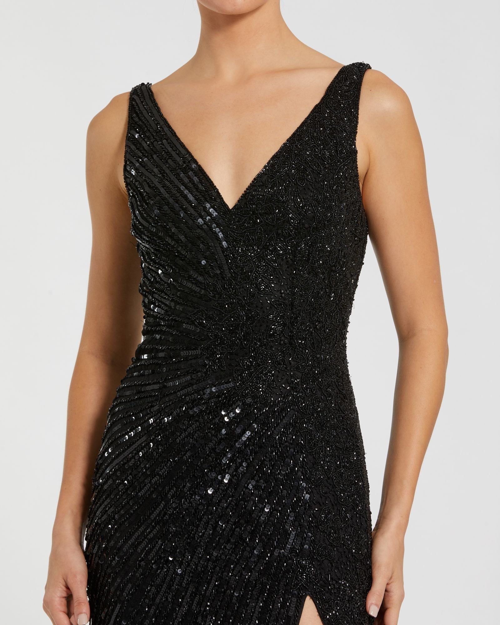 Black sequin dress on a white background