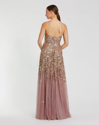 Back view of a model in a Gold Amethyst strapless sequin gown, showing the A-line silhouette and back zipper.