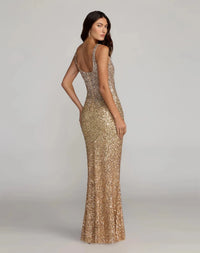 Woman wearing a gold sequin evening gown against a gray background