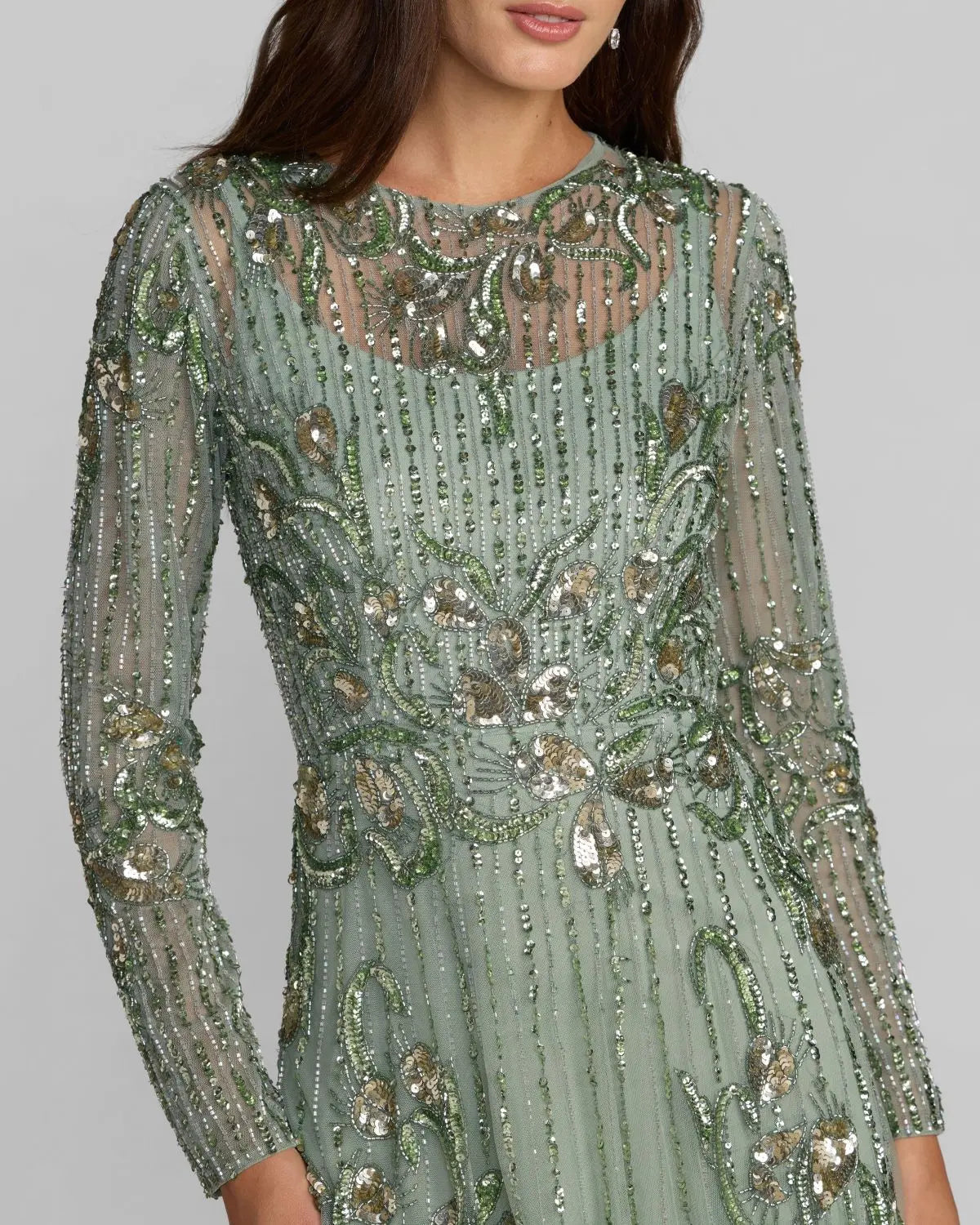 close up of model wearing Sage green floral embroidered tulle gown, style 6238, romantic V-neck, floor-length formal dress.