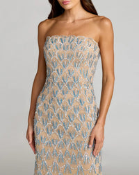 Full length view of model wearing Mac Duggal 6250 strapless embellished gown outdoors
