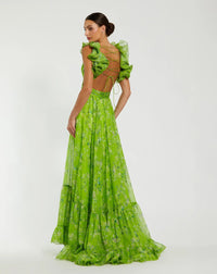 Woman wearing a green dress with ruffled top on a white background