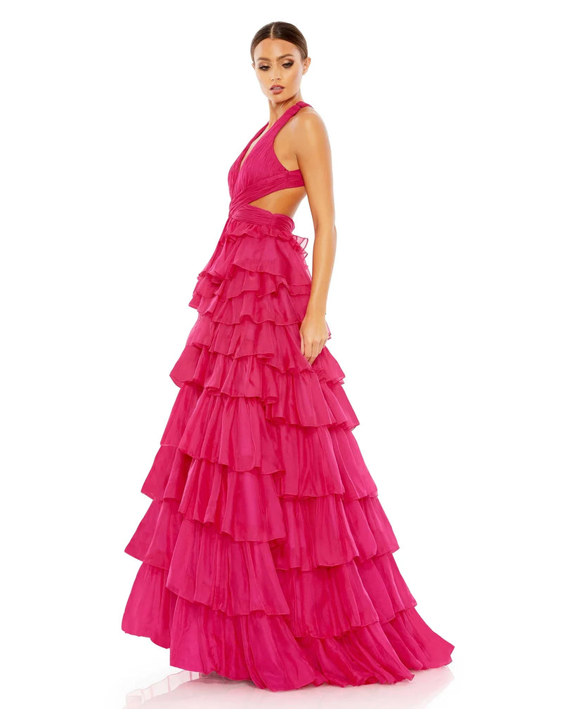 This show-stopping, hot pink fuchsia, prom dress is styled with a pleated bodice with a deep neckline, waist cutouts, and crisscross center providing the perfect amount of cleavage. With decadent layers of graduated ruffles fill out the full skirt for a design that’s festive and flirty, perfect for Summer weddings and parties side view