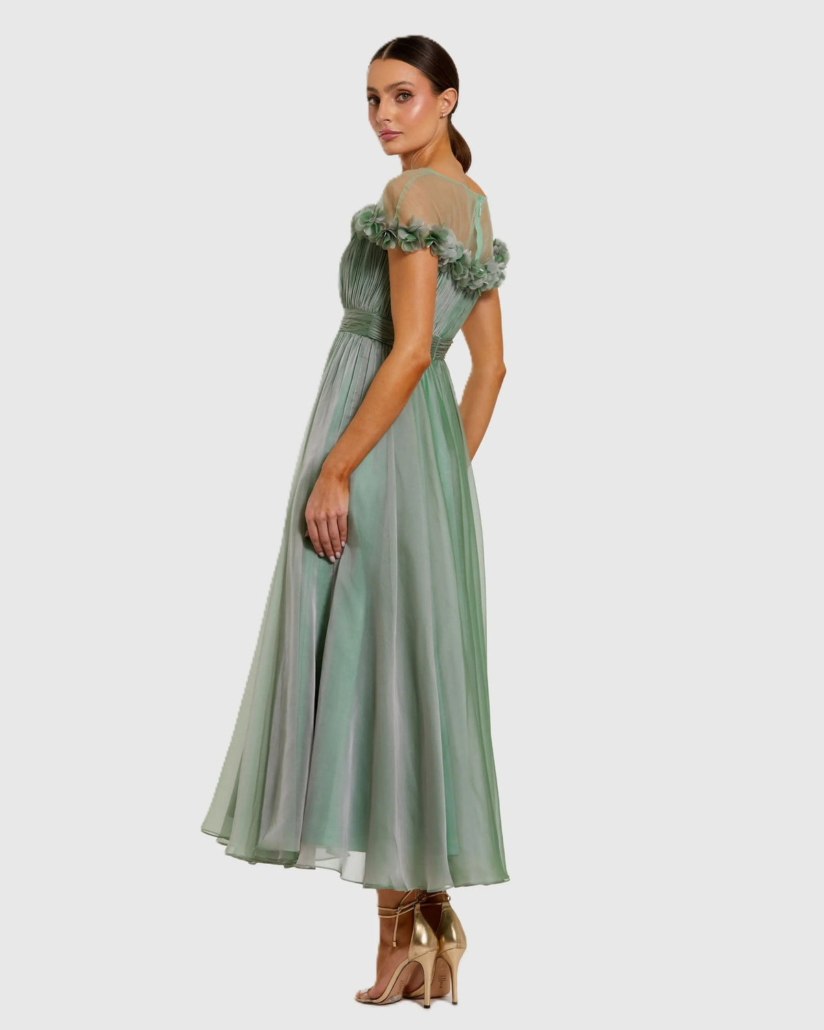 Back-view-of-sage-green-A-line-midi-dress-with-sheer-yoke