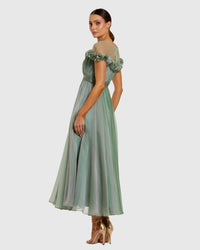 Back-view-of-sage-green-A-line-midi-dress-with-sheer-yoke
