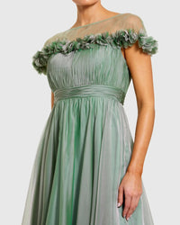 closeup-view-of-sage-green-A-line-midi-dress-with-sheer-yoke