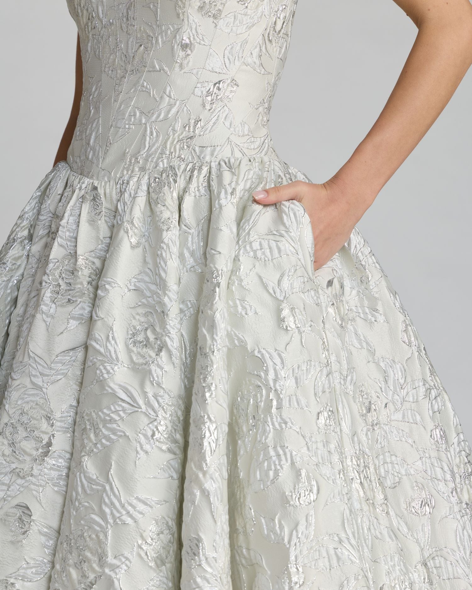 Ivory brocade dress detail