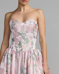 Strapless floral dress with a gray background