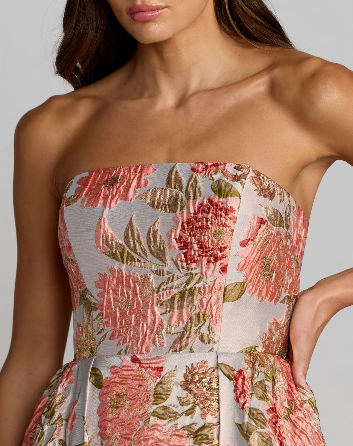 close-up-view-of-elegant-shimmering-pastel-brocade-evening-gown-69169