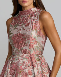 Woman wearing a floral dress with a neutral background