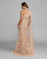 Back view of the blush mermaid gown, showcasing the sheer illusion back and flared silhouette.