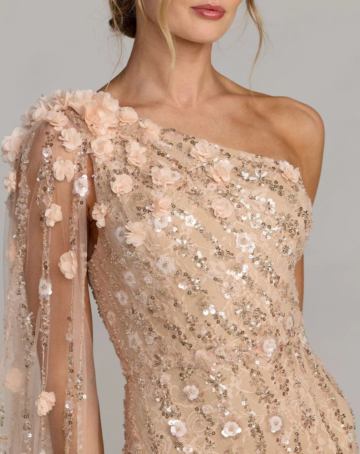 Detailed macro shot highlighting the intricate lace, embroidery, and gem embellishments.