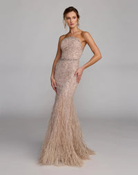 77103-Champagne-AB.jpg: Full-length front view of the strapless Champagne evening gown featuring pearl embellishments and a dramatic feathered hem.
