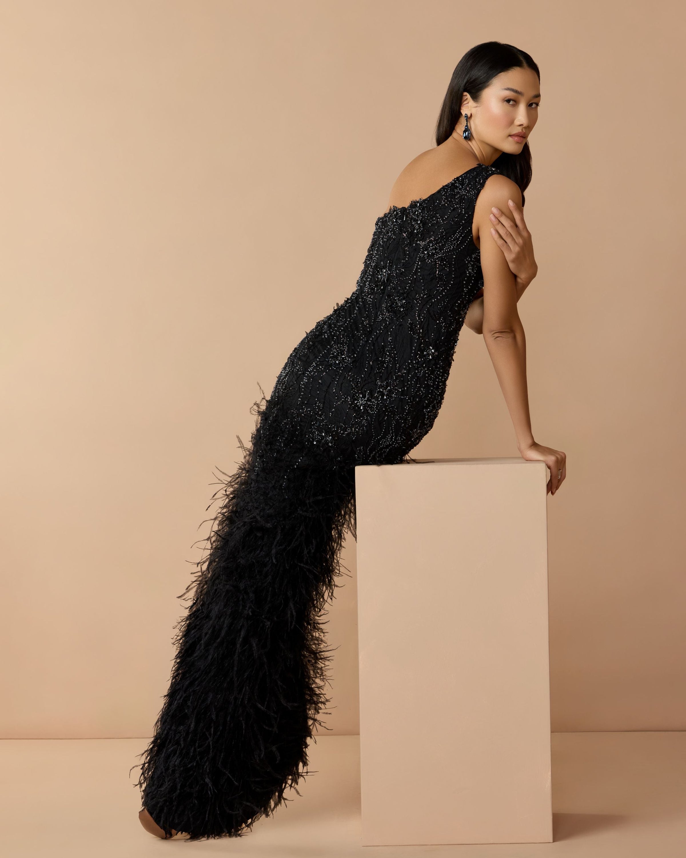 Mac Duggal #77112 black feather gown lifestyle back view
