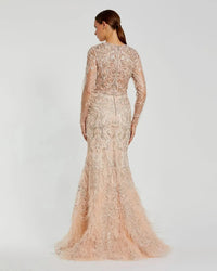 Full length back view of Mac Duggal 79267 blush embroidered gown featuring sheer long sleeves and feather trim hem