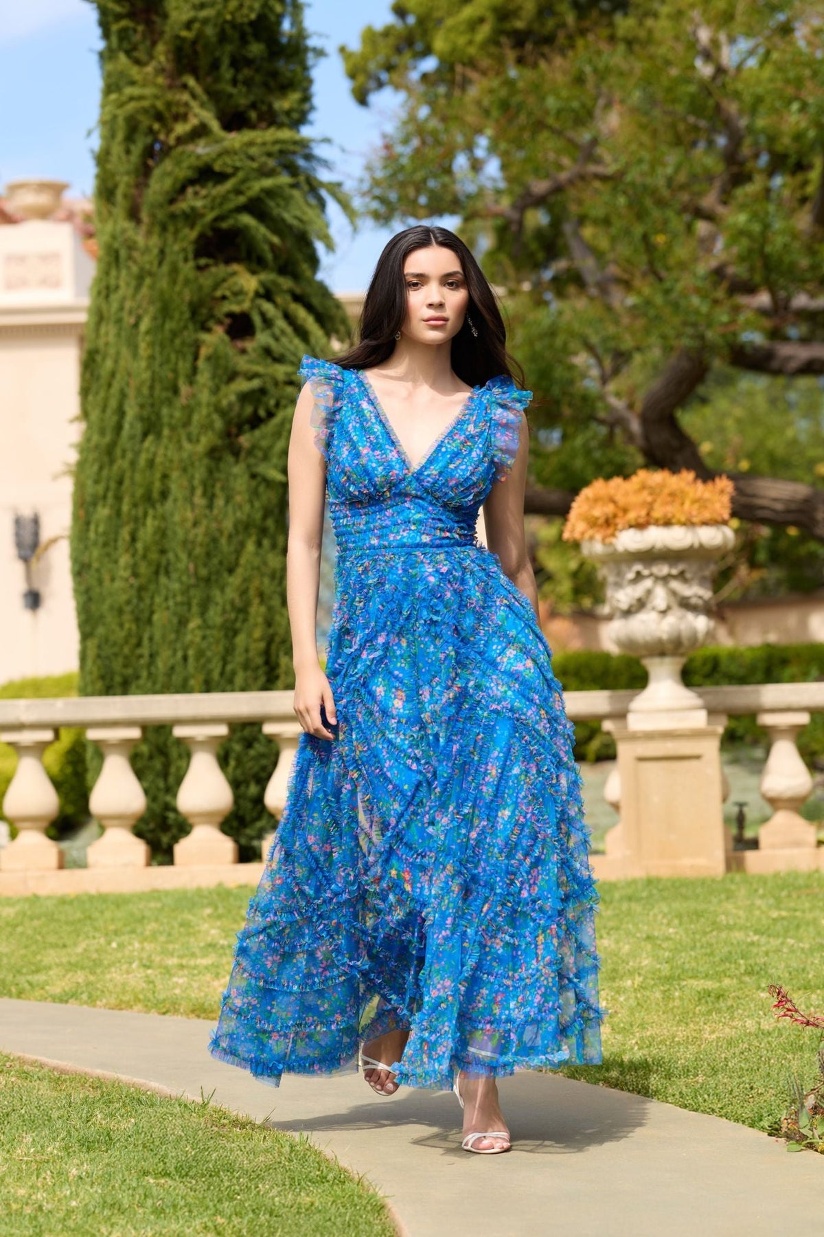 Detailed-shot-of-micro-ruffle-texture-on-blue-floral-mesh-gown