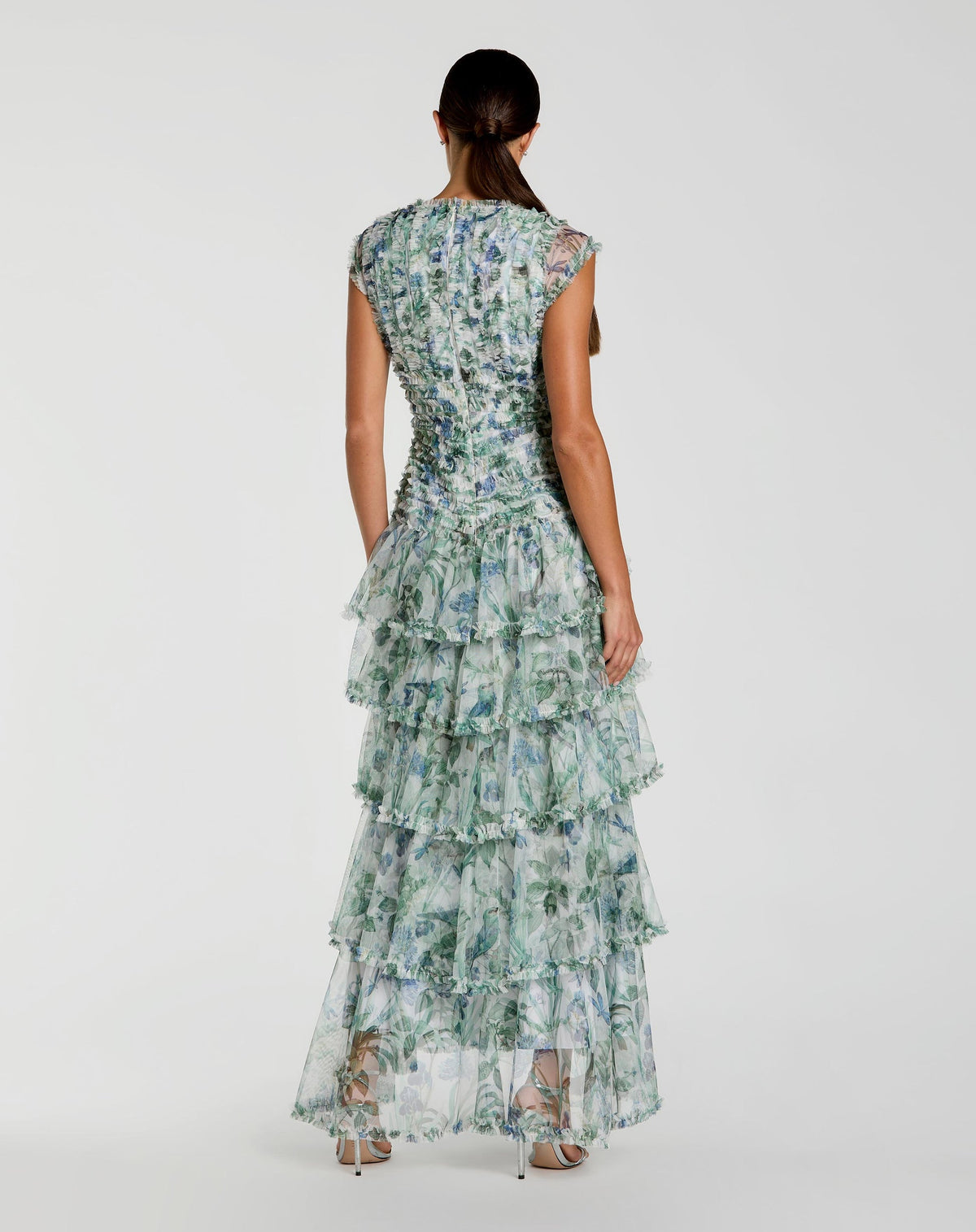 studio shot back view of model wearing Mac Duggal Blue Floral V Neck Tiered Ruffle Maxi Dress #8423