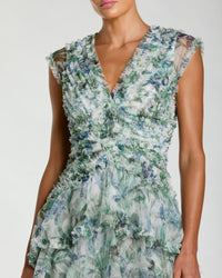 close up studio shot of model wearing Mac Duggal Blue Floral V Neck Tiered Ruffle Maxi Dress #8423