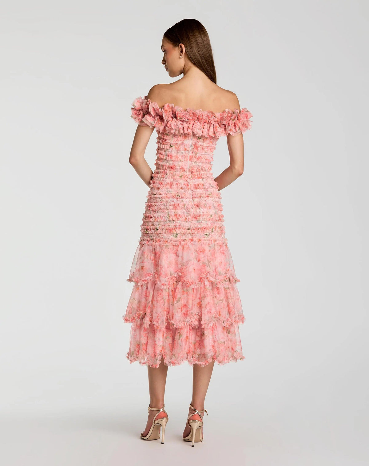 Back view of model wearing Mac Duggal 8432 pink ruffle midi dress