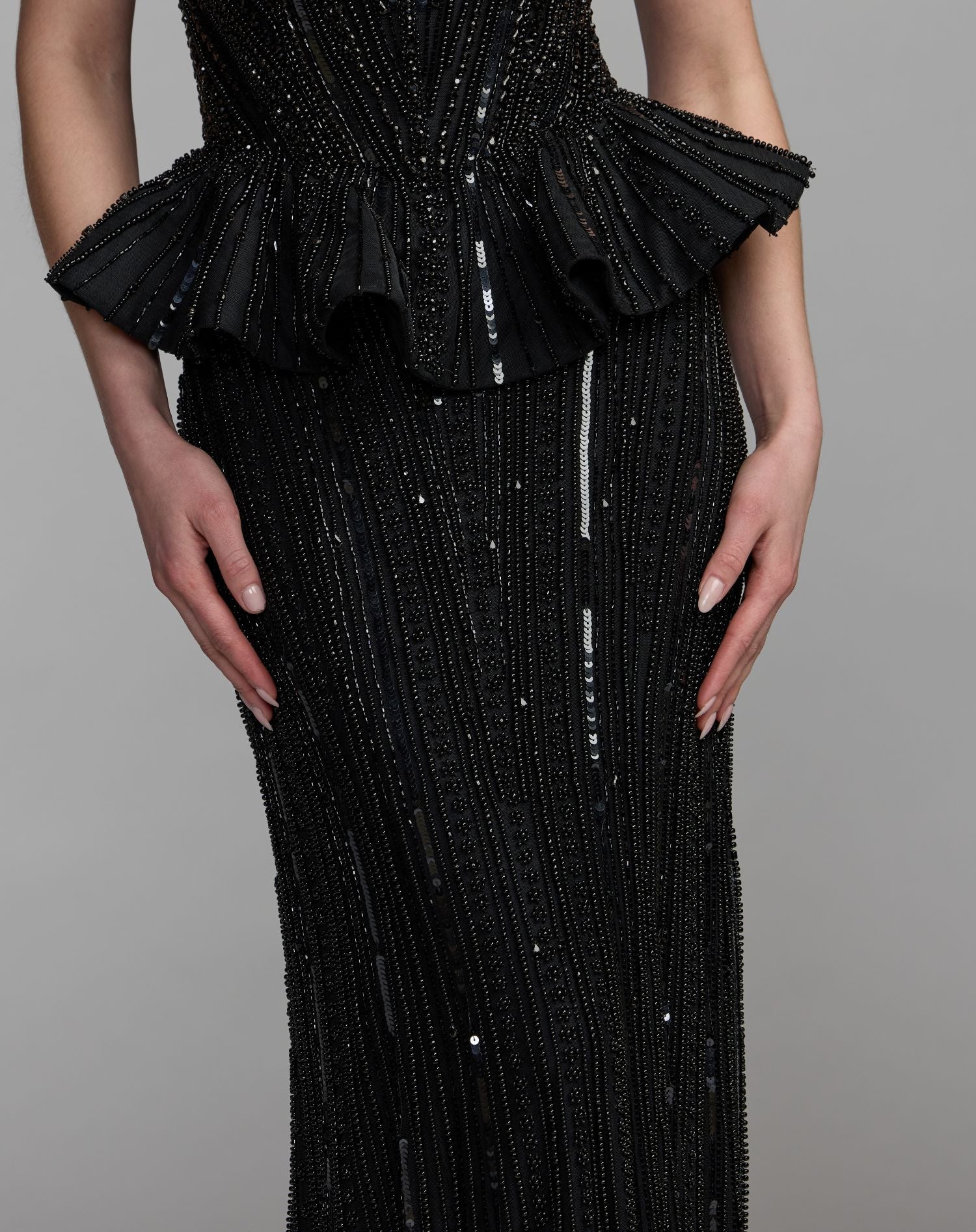 Mac Duggal #86018 black gown peplum waist detail