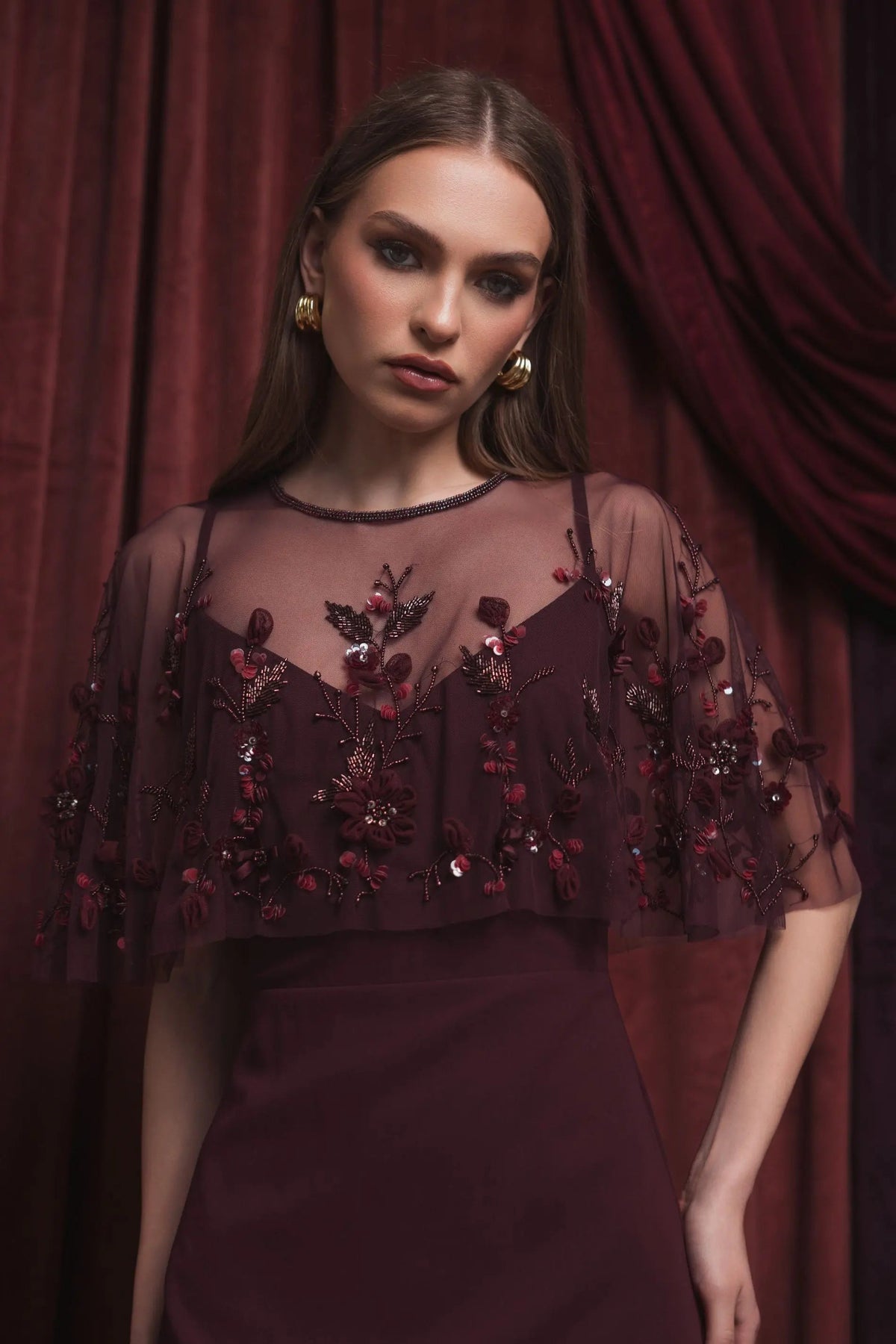 Mac Duggal #9229 plum cape gown lifestyle close up