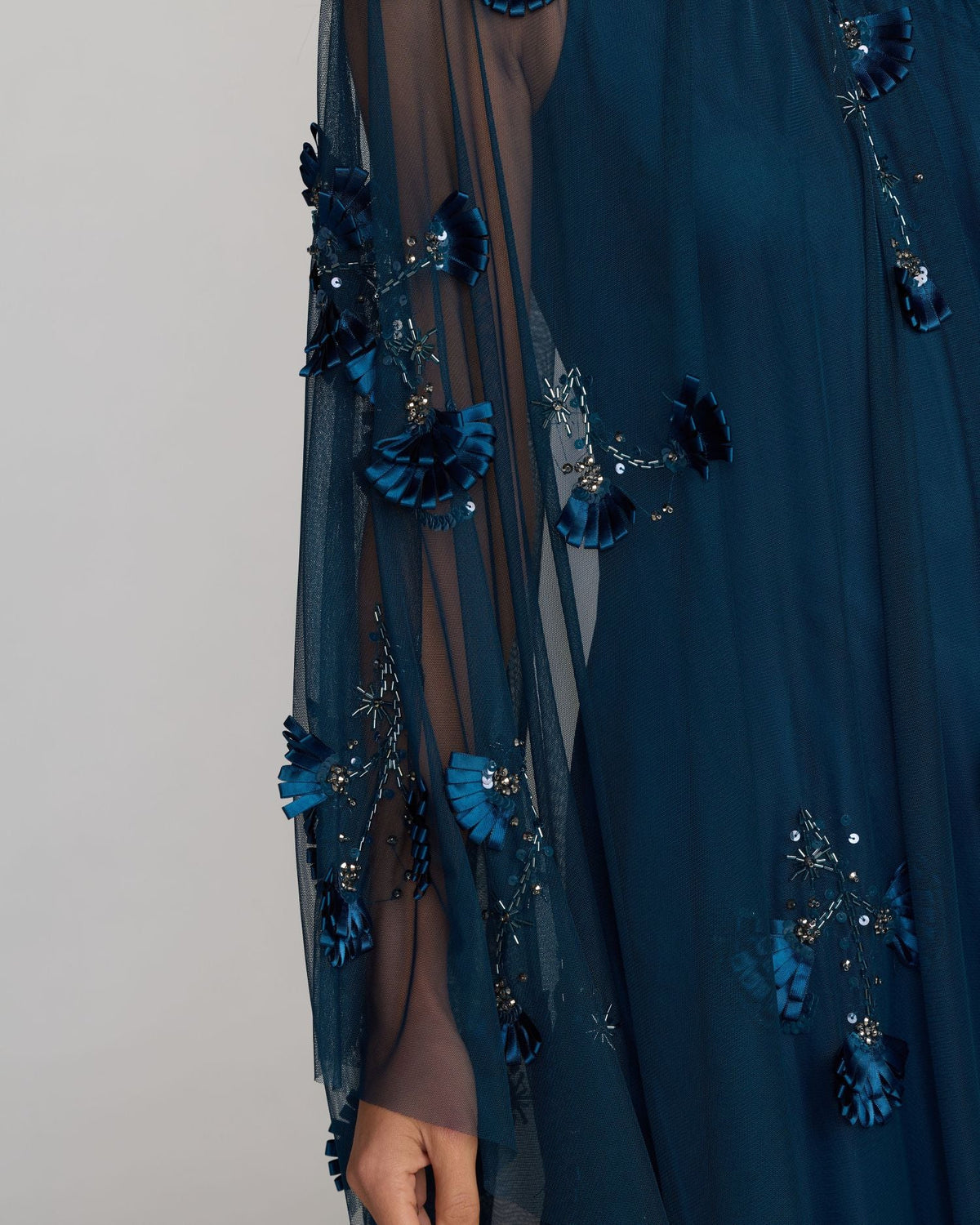 Asymmetrical-hem-evening-gown-in-twilight-blue-embellished-mesh