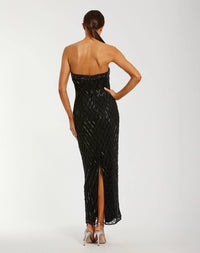 Back view of Mac Duggal 94288 black strapless evening gown featuring back slit and concealed zipper