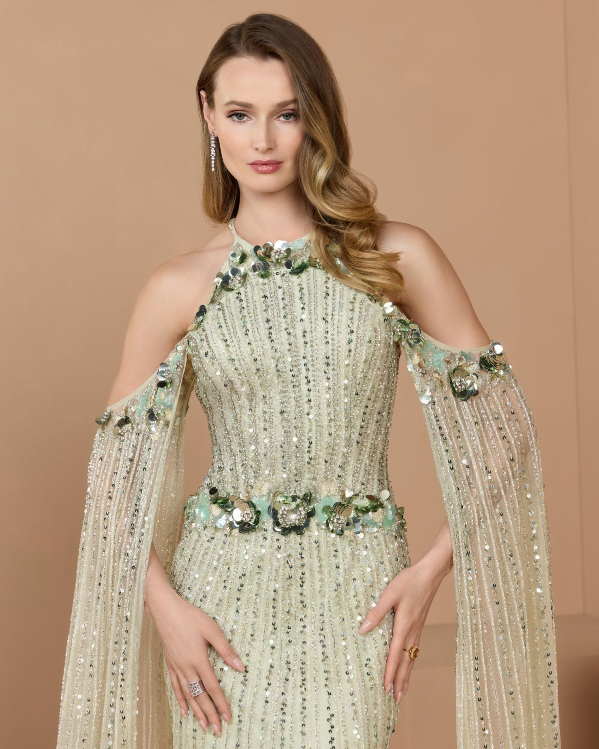 Detailed close-up of the embellished halter neckline and waist featuring 3D paillette sequin flowers.