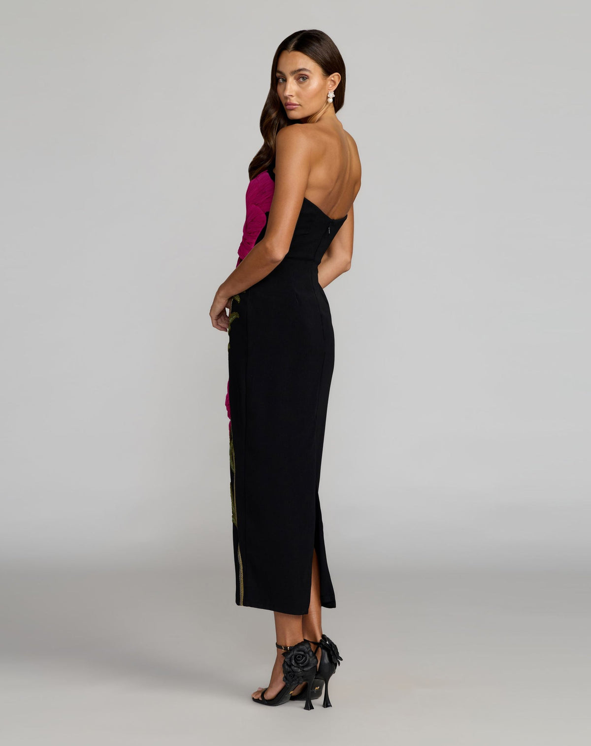 Back-view-of-strapless-black-multi-formal-sheath-dress