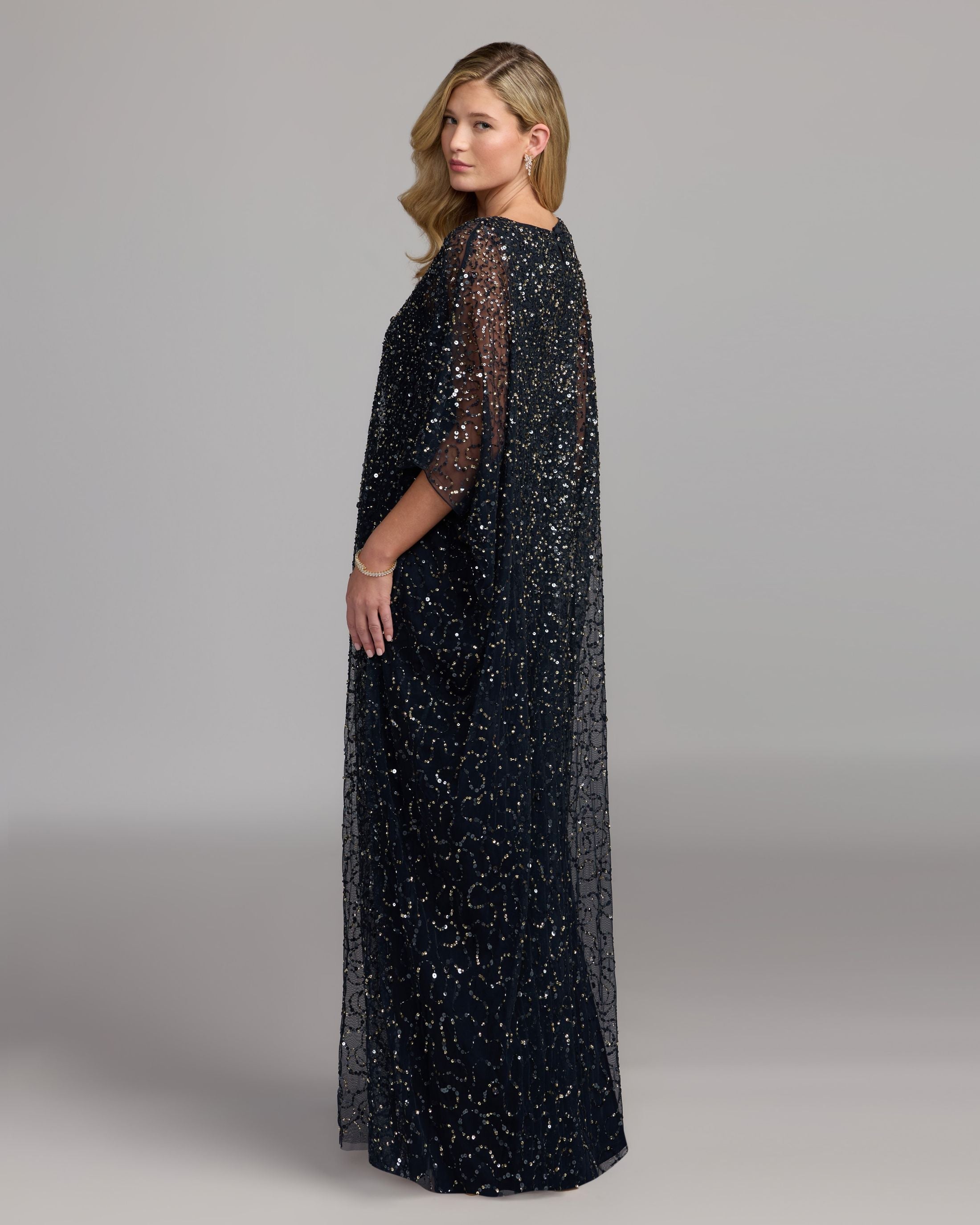 Mac Duggal #9475 midnight gold kaftan gown back view