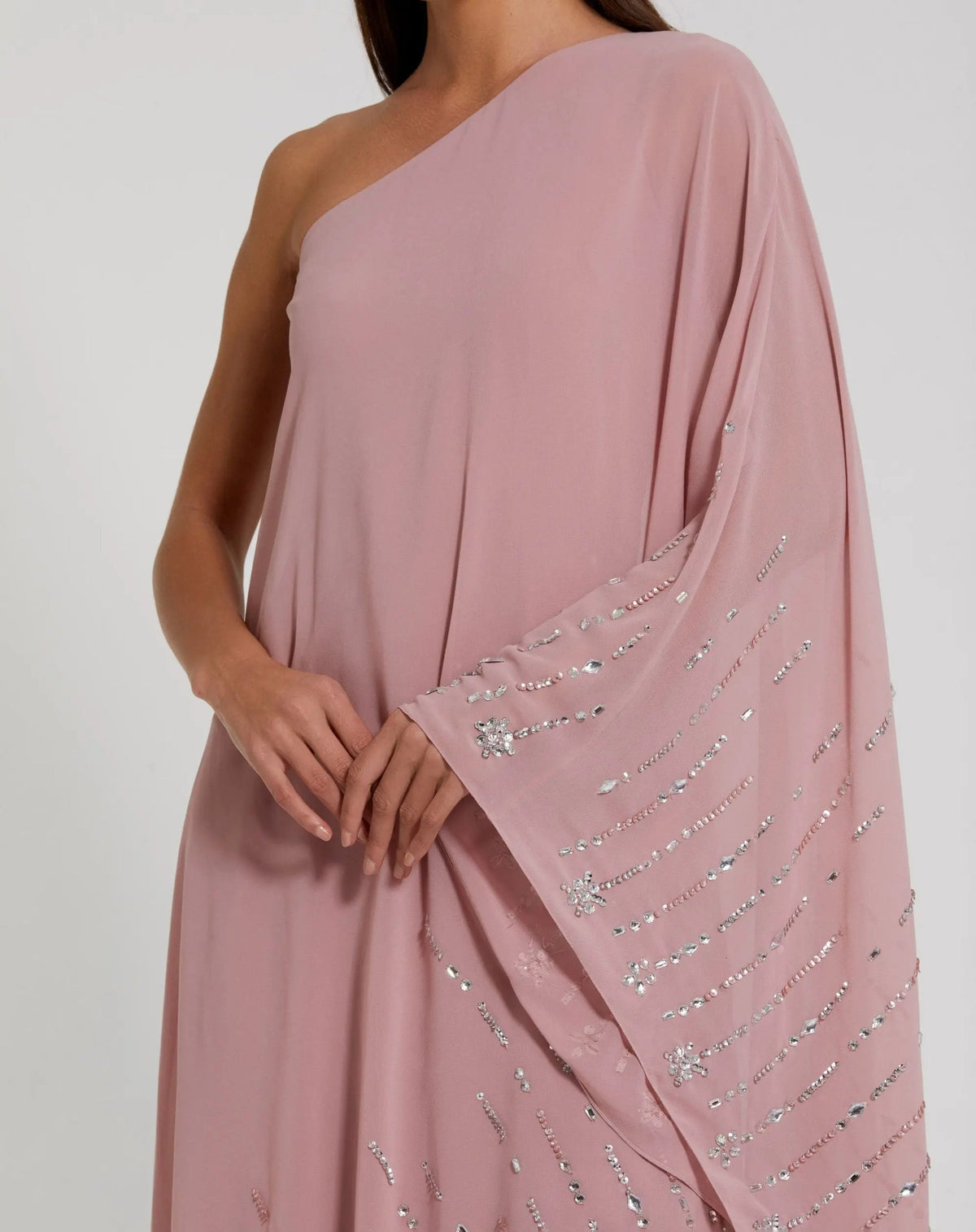 Close up torso shot of only the Mac Duggal Pink One Shoulder Embellished Trim Kaftan Gown #9517
