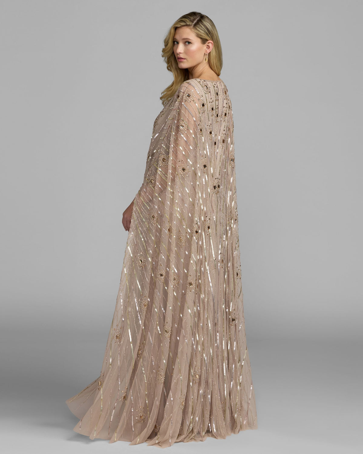 Mac Duggal #9526 champagne beaded boat neck kaftan gown back view